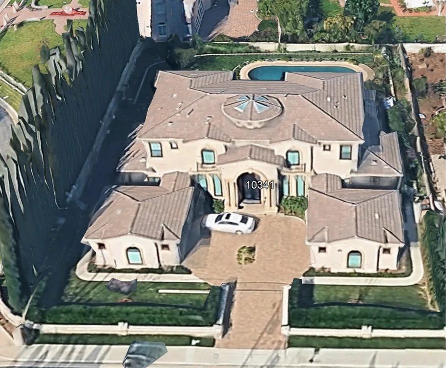 Aerial bird's eye view of a completed luxury custom home built by Newport Construction Group in Villa Park, CA