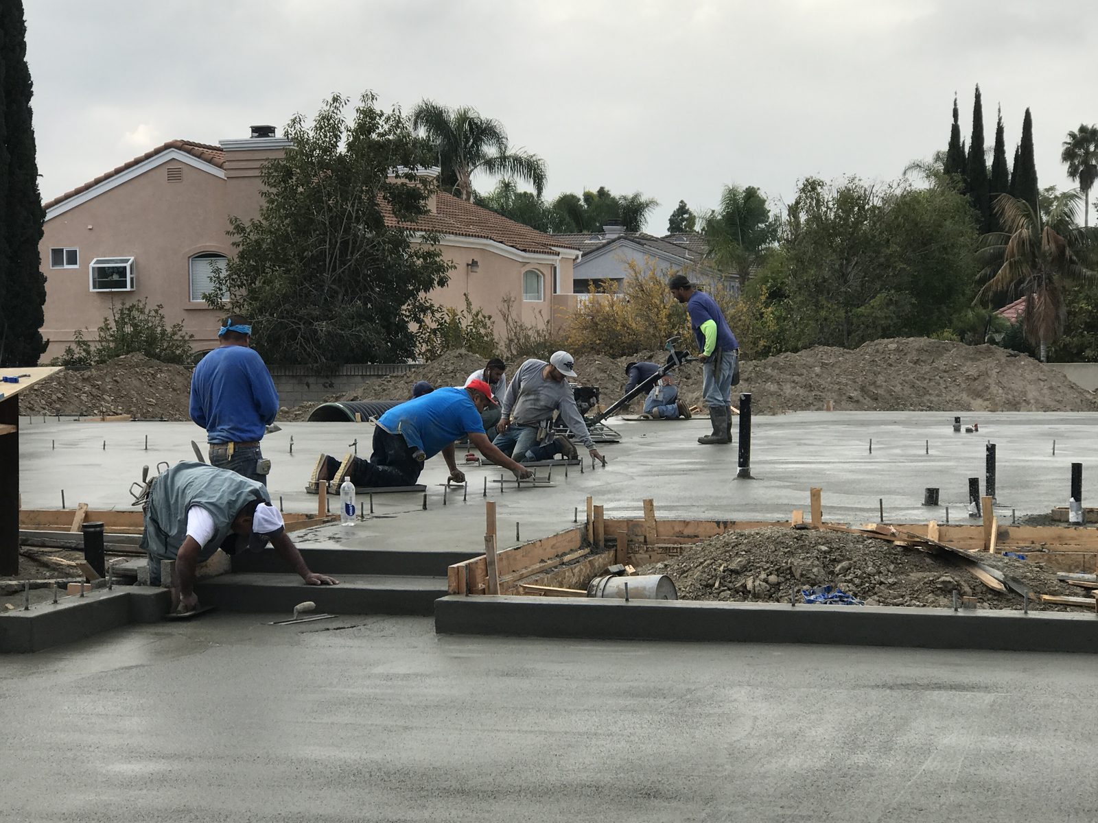 Engineered concrete slab foundation pour and finishing by Newport Construction Group in Orange County