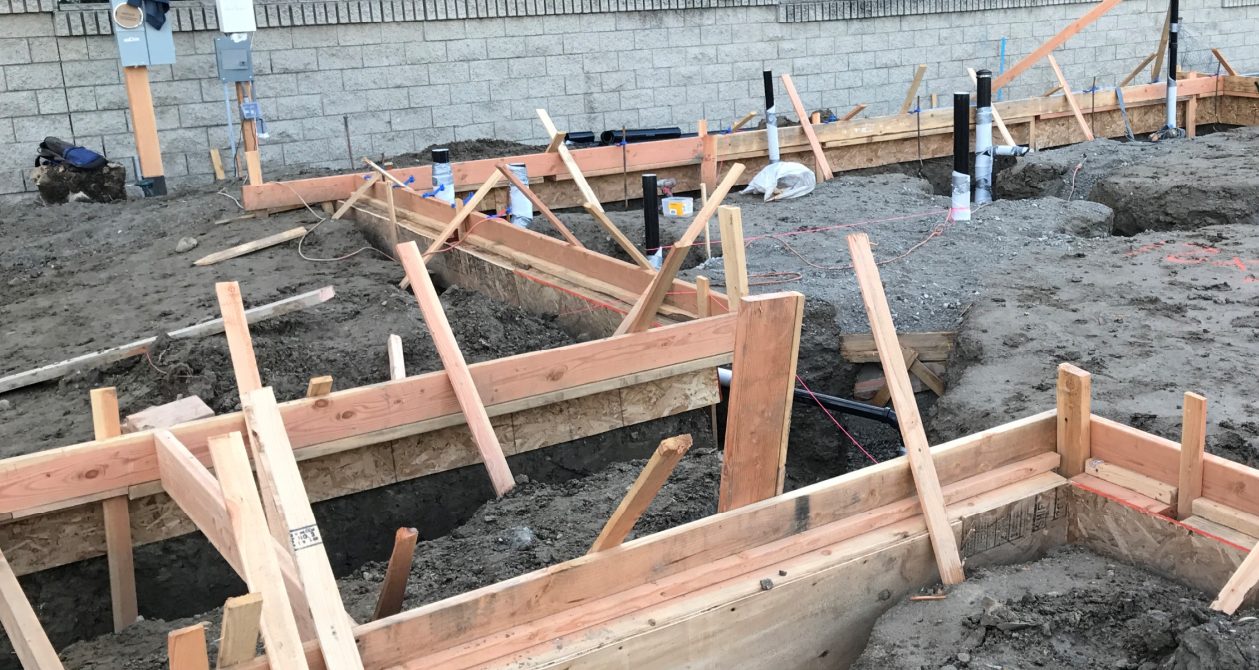 Precision foundation wood framing, trenching, and rebar reinforcement by Newport Construction Group