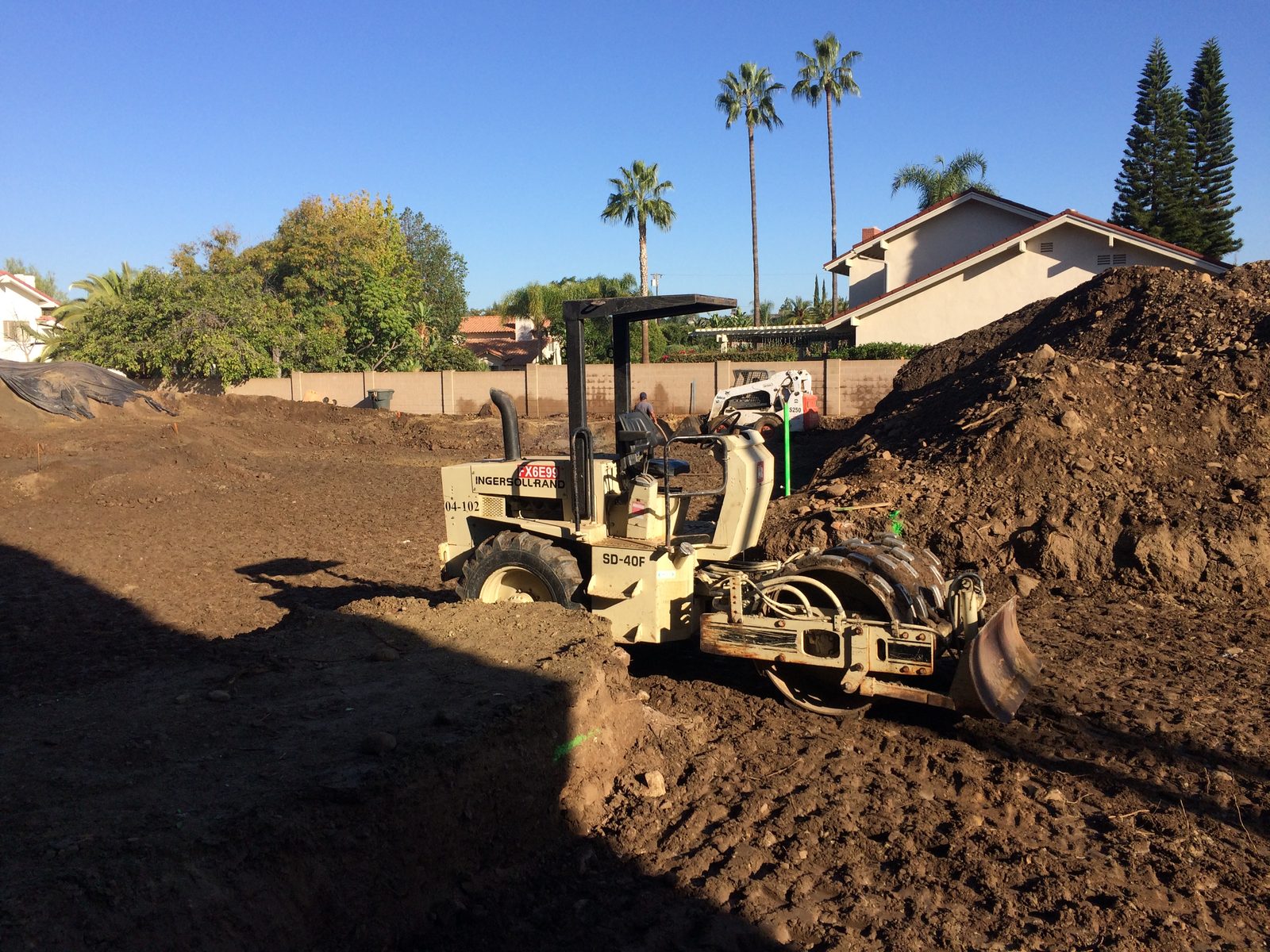 Civil engineering site grading and soil compaction operations by Newport Construction Group